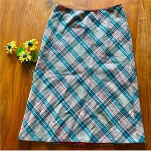 Brown “Burberry” style plaid, midi skirt.